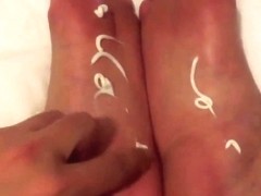 Rubbing lotion into my sexy feet