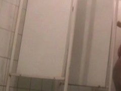 Shower spy cam amateur exposes tits and hairy cunt