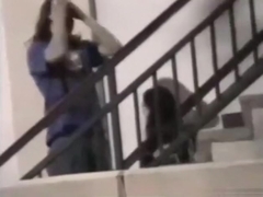 Voyeur tapes a couple having sex on public stairs outside