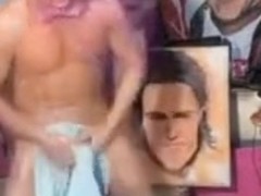 Pricasso paints portrait with his cock .