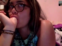 Teen latina having fun in front of webcam