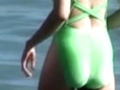 Green swimsuit is worn by the candid amateur babe 03c