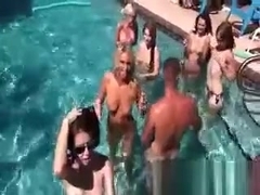 Topless bitches tanning by the pool