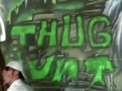 White guy sucks black cock outdoors