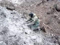 Getting muddy in waders