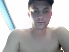 Cute gay is having fun in his room and filming himself on web cam