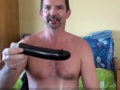 Stretched and buzzed by a big black dildo!