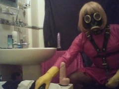 Mature T-Slut latex toy session