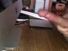 slow motion cumshot on desk