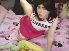 Sissy cheerleader poses and gives herself a facial