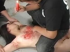 Luscious Asian slut bound and covered in hot wax