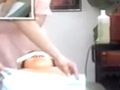 Cute Jap lassie gets some hot massage on hidden camera