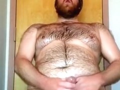 Plugged Oiled Bear orgasms