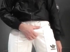 twink pissing in his Adidas tracksuit