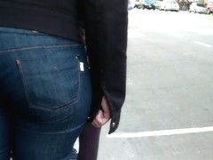 Brunette babe on the street in huge ass tight jeans video