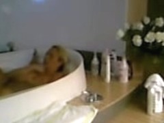 My hidden cam recorded a beautiful lady relaxing in the bath