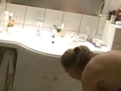 Spying MILF in the bathroom