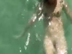 Spying horny couple on the beach