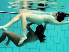 Lesbian fun underwater and naked stripping