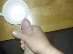 Watch me stroke my big cock and bust a massive load on kitchen table