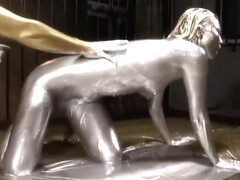 Girl covered in multiple layers of paint having orgasm