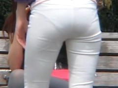 Street candid view of the sexy ass in white pants