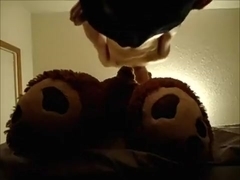 Fucking a giant stuffed teddy bear with condom