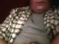 Fat guy soaks shirt with cumshot