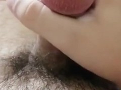 Masturbating