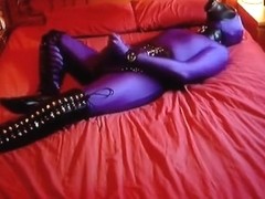 Playing in sheathed zentai, leather and rubber