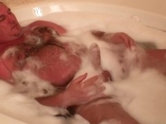 Daddy jerks off in the jacuzzi tub