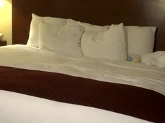 Silver Daddy on the hotel bed