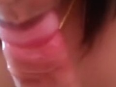 Breasty Oriental girlfreind swallowing his load