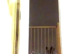 Buttplug on balcony while crossdressing