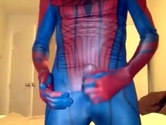 playing in Spiderman suit