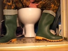 nlboots - green boots and camo overalls on toilet