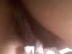 Slut with hairy muff is seen masturbating in the clip