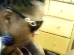 Black slut with sunglasses takes cock deep in her mouth