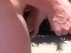 Pervert wife has pleasure with strangers at undressed beach