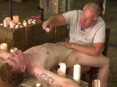 Sebastian Kane caresses sub youngster with candle wax