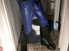 nlboots - blue rubber catsuit, rubber jack, riding boots