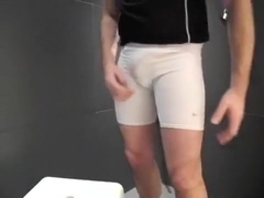 twink pissing in his Adidas tracksuit