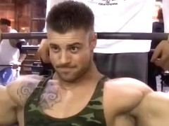 Inked Steve pumping and flexing