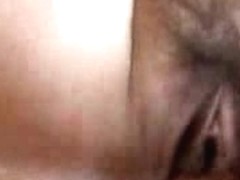 She sucks his cock until he drops a load right on her sexy face
