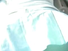 Bare bottom upskirt brunette in a baby blue skirt captured on film