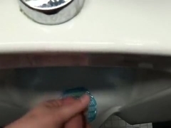 Urinal piss play and cum.