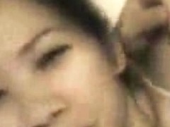Cute Asian chick lets her white friend film while fucking her