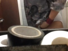 Amateur slides down full back panty before pissing on toilet