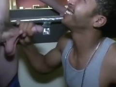 Interracial blowjob in a restaurant