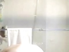 Spying my gf in bathroom. I love her boobs